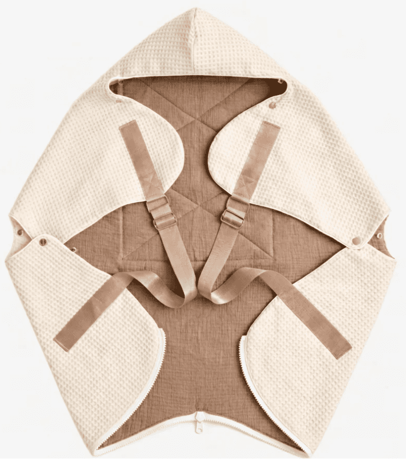 Ergonomic KESLOVE Cream baby carrier made of natural waffle muslin fabric, top view.