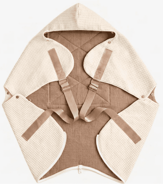 Ergonomic KESLOVE Cream baby carrier made of natural waffle muslin fabric, top view.