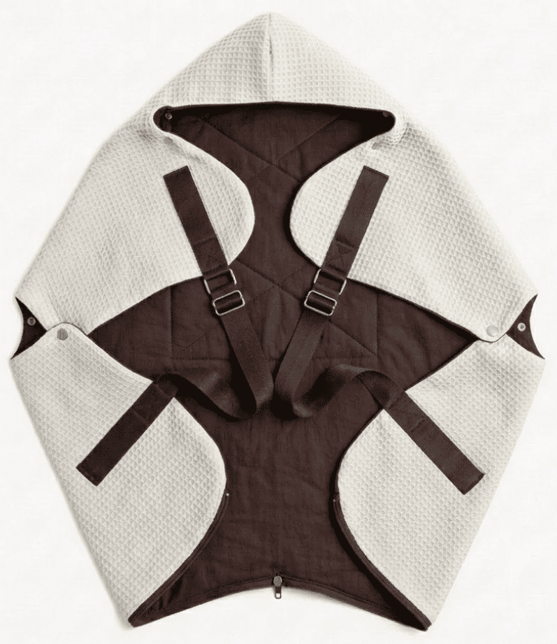 Ergonomic KESLOVE Ivory baby carrier made of natural waffle muslin fabric, top view.