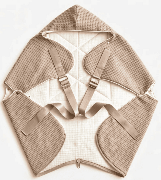 Ergonomic KESLOVE Oatmeal baby carrier made of natural waffle muslin fabric, top view.