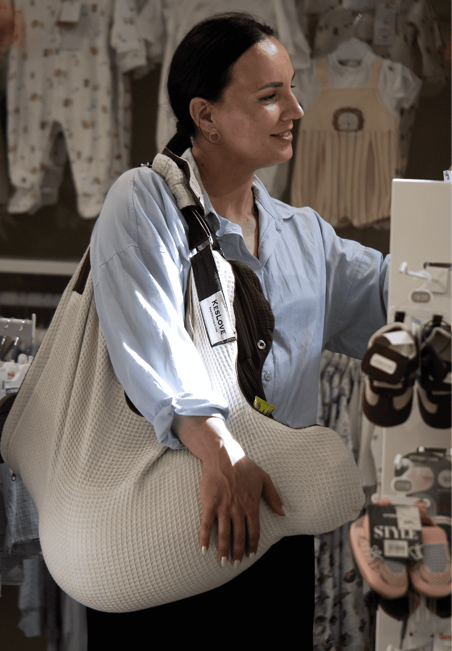 KESLOVE original ergonomic infant carrier in neutral color.